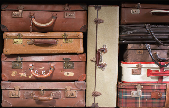 Multiple vintage suitcases