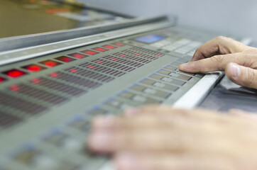 Hands on fountain key color management control unit. Offset machine press print run at table