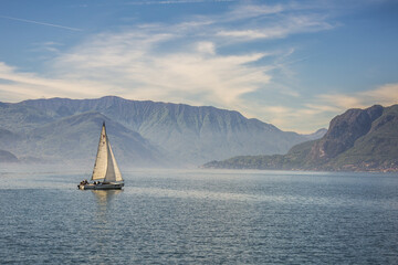 Fototapeta premium Sail boat on the waters of Lake Como, Lombardy, Italy.