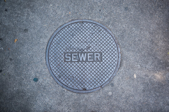 Sewer sidewalk cover