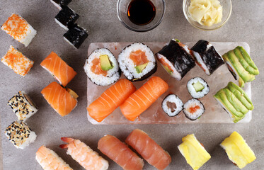 sashimi sushi set with soy - sushi roll with salmon and sushi roll with smoked eel