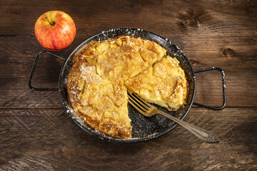 Apple puff pancake pie with apple and copyspace