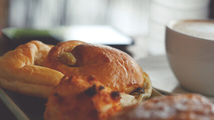 Cappuccino with a French roll for breakfast