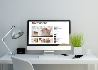 modern clean workspace with video streaming website on screen