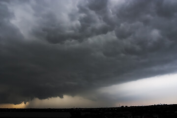 Dramatic view of Heavy Storm cloud and Dark sky Background.