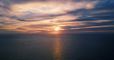 red sunset over the Mediterranean sea. flight.