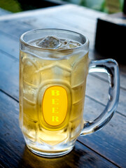cool beer glass on old table