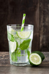 Mojito cocktail in glass on wooden table
