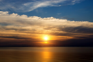 Naklejka na ściany i meble Sunset sky at the lake