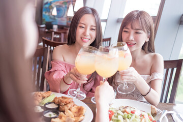 women dine in restaurant