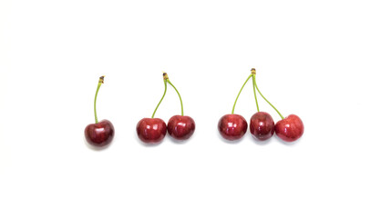 Obraz na płótnie Canvas Sweet cherries isolated on white background