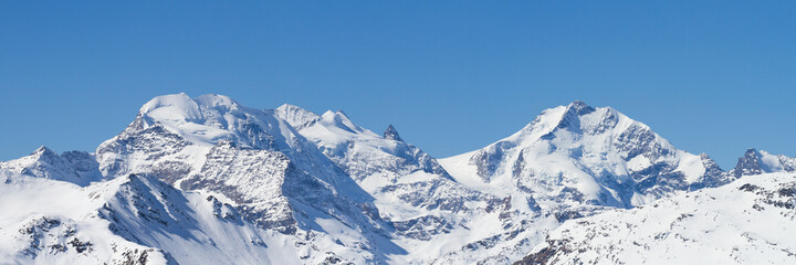 Fototapeta na wymiar Panoramic winter view from Livigno of Bernina grouppe