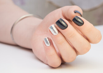 Fototapeta premium Hands with beautiful manicure. Natural nails with gel polish