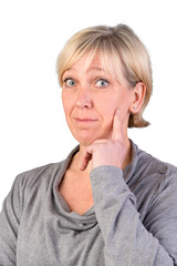 Portrait of a astonished attractive mature woman - isolated on white background