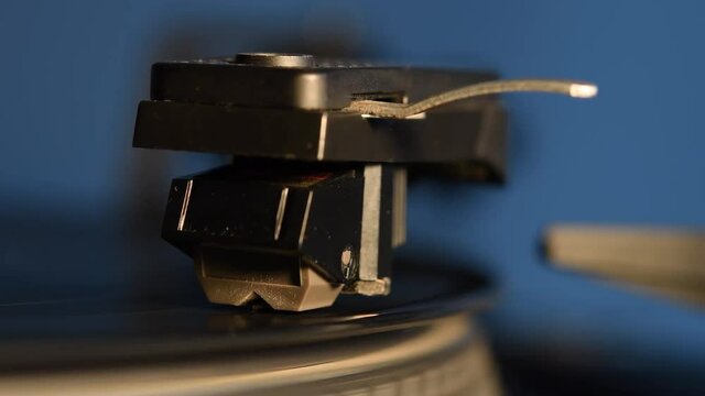 Record player playing an old fashioned vintage vinyl record