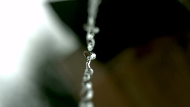 Water stream drip in super slow motion
