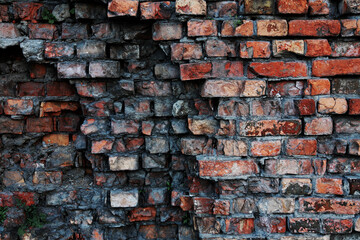 The dilapidated brick wall