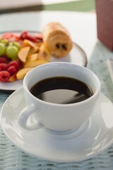 Close up of coffee cup on table