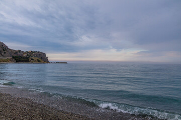Sunset on a Mediterranean beach of Ionian Sea - Bova Marina, Calabria, Italy