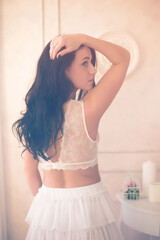 Obraz premium Girl in a delicate white dress , vintage style