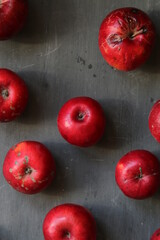 Red apples on the vintage table