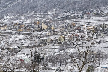 View of the village of Montagna in Valtellina in winter. Montagna, Valtellina, Lombardy, italy. Europe
