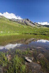 Reflections in the Baldiscio lake. Baldiscio lake, Campodolcino, Vallespluga, Valchiavenna, Lombardy, Italy.