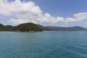 Turquoise water on golden sand in the Andaman Sea