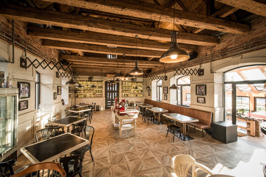 Retro decorated restaurant with wooden ceiling