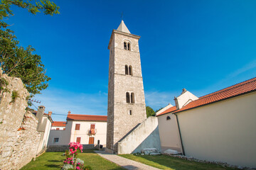 Fototapeta na wymiar Tower bell of church of Saint Anselmo in Nin, Dalmatia, Croatia 