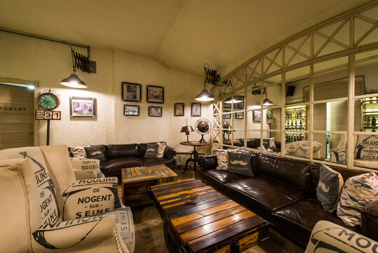 Luxury sofa seats in modern caffe bar or hotel reception