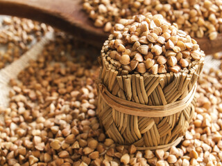 buckwheat groats and wooden spoon