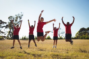 Group of kids having fun in the boot camp