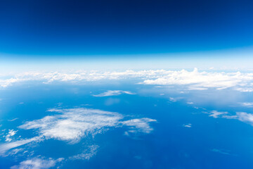 Naklejka na ściany i meble Clouds, a view from airplane window