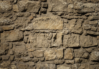 Old brown stones wall pattern