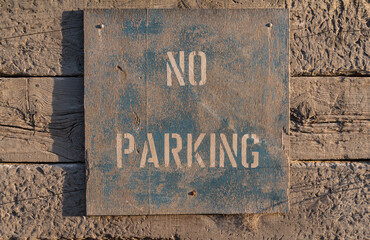 weathered and faded grunge texture no parking sign background