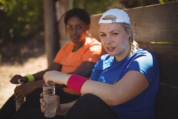 Portrait of friends relaxing after workout 