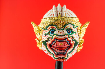 Khon, hanuman mask on red background. Ramayana, thailand