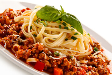 Spaghetti bolognese on white background 