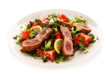 Beef with vegetables on white background
