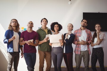 Obraz premium Thoughtful creative team standing at office