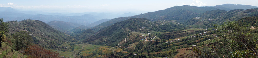 Fototapeta na wymiar Terraces and village in mountain
