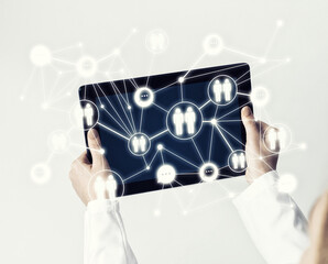 Close of female doctor hands working with tablet pc computer