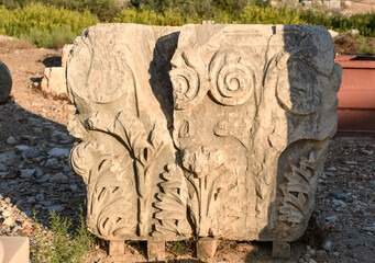 Stone with carved on Main street in ancient Lycian city Patara. Turkey