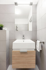 Beige bathroom with countertop basin