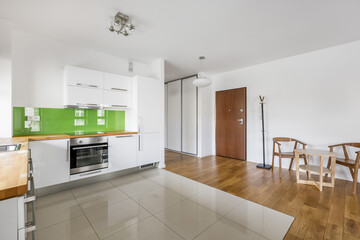 Kitchen with white furniture