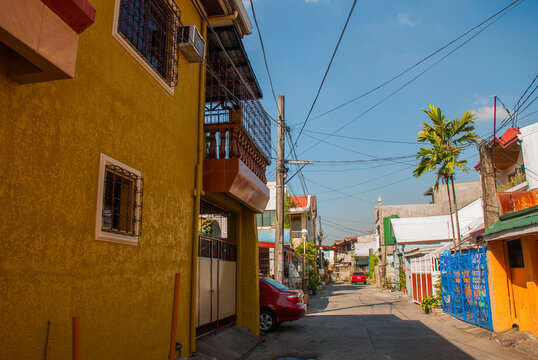 Local street with houses. Philippines Manila