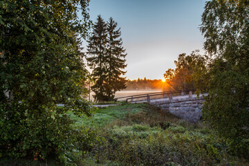 Summer morning landscape with old bridge, Finland