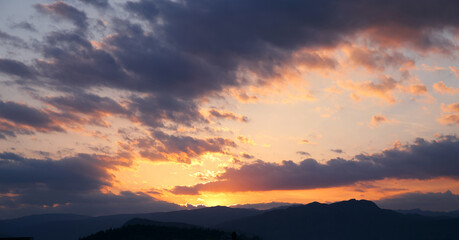 Naklejka na ściany i meble Sunset. Sky clouds background. Ridge Mountains silhouette. Skyline. Montenegro