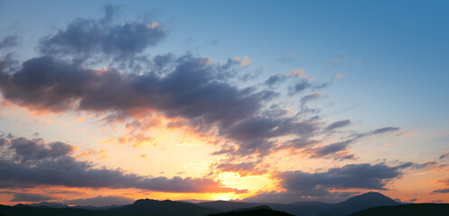 Fototapeta na wymiar Sunset. Sky clouds background. Ridge Mountains silhouette. Skyline. Montenegro